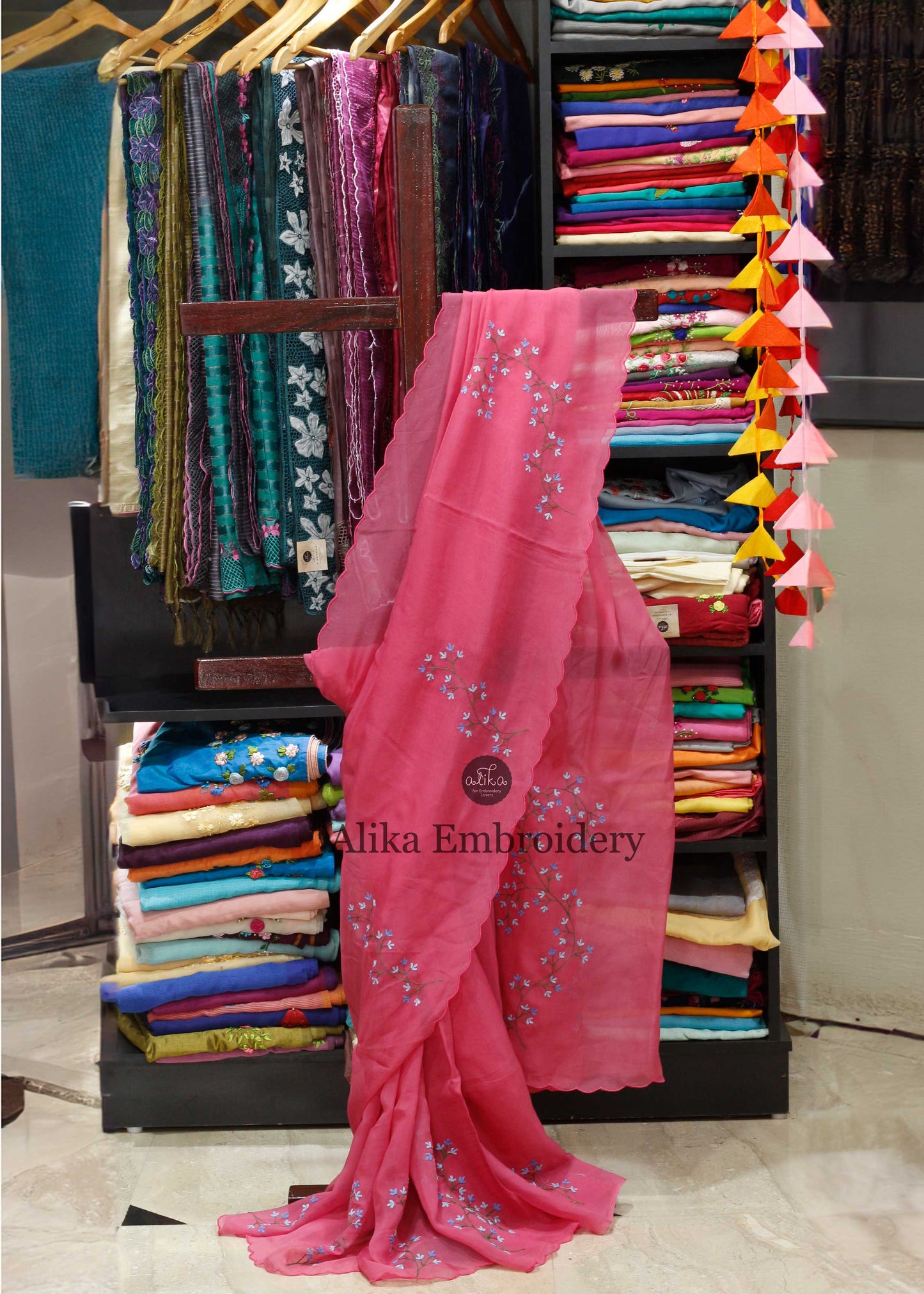 Elegant Pink Organza Saree with Blue Floral Embroidery