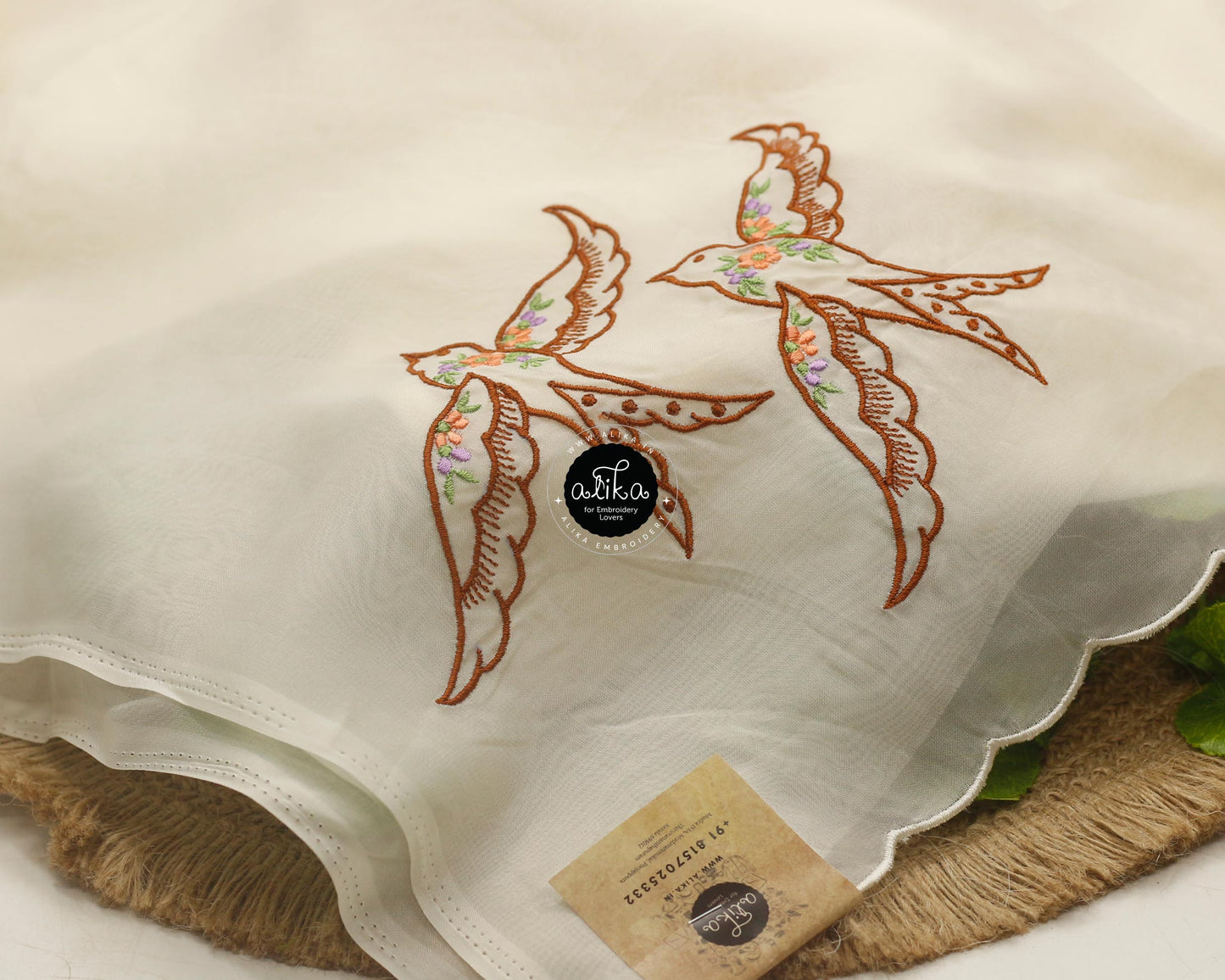 Pastel Cream Organza Saree with Flying Bird Embroidery – Elegant & Exquisite Design