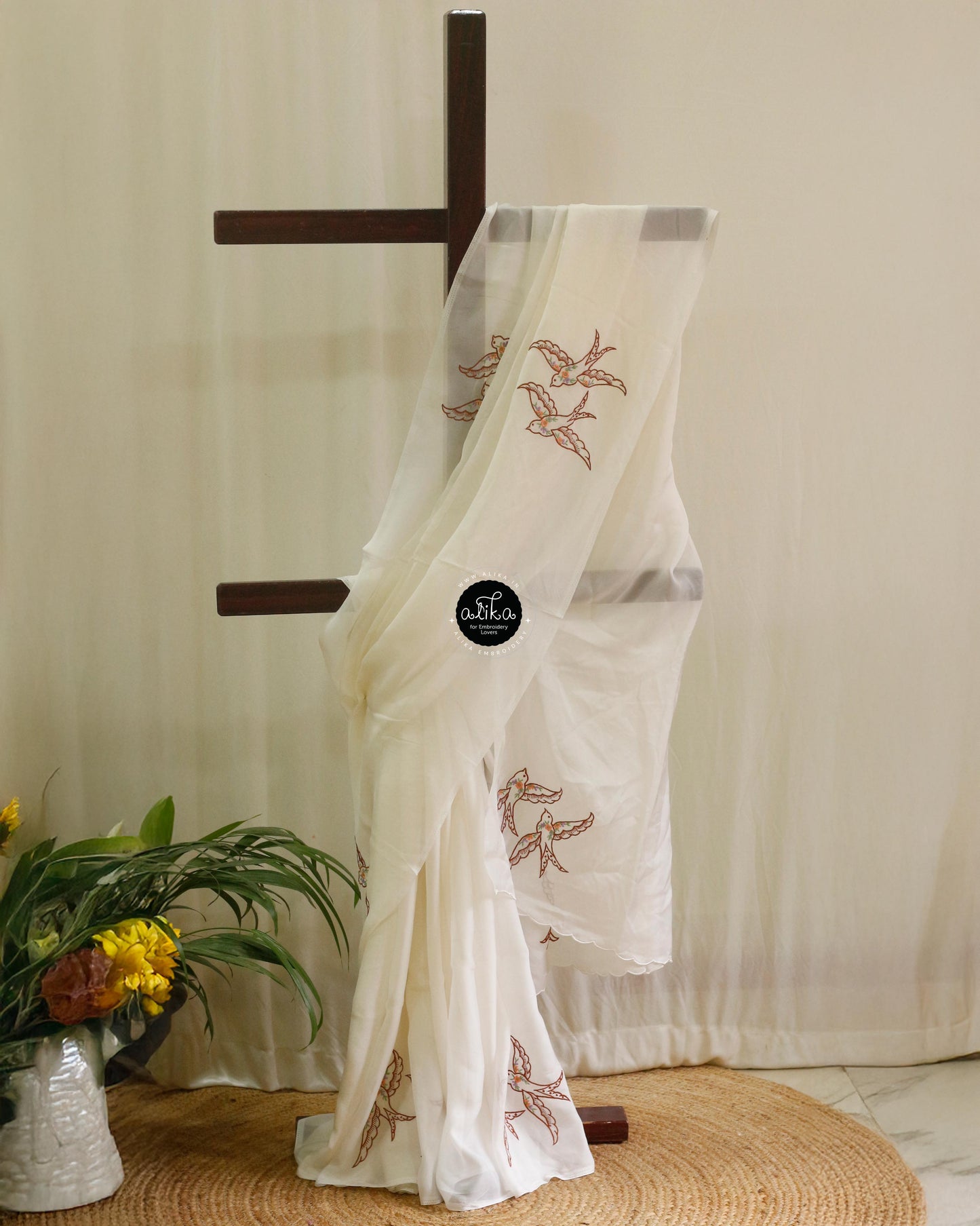 Pastel Cream Organza Saree with Flying Bird Embroidery – Elegant & Exquisite Design