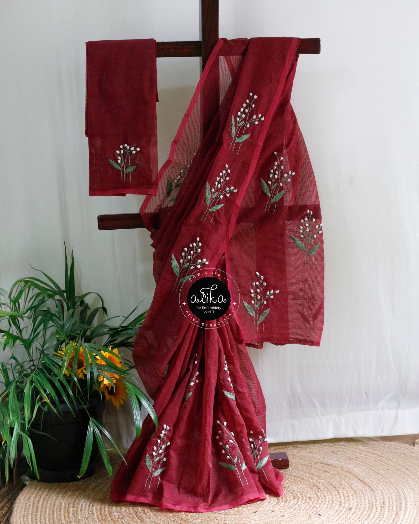 Radiate Festive Charm in the Mesmerizing Red Noel Kota Saree with Hand Embroidery