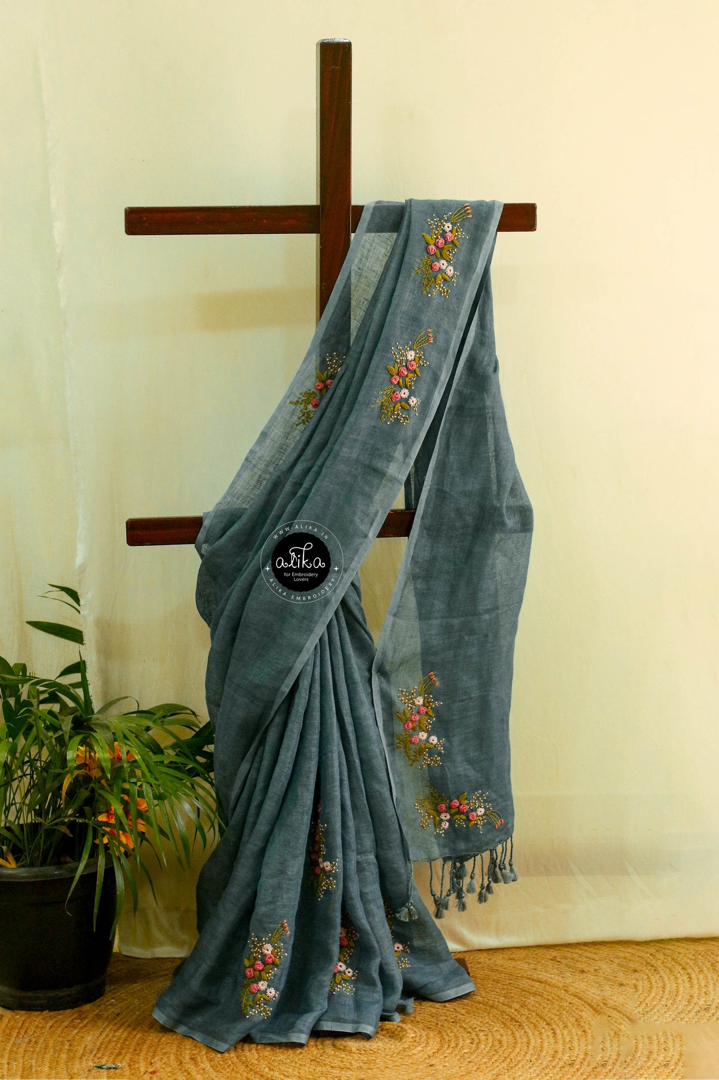 Elegant Faded Ash Linen Saree with Intricate Handcrafted Detailing