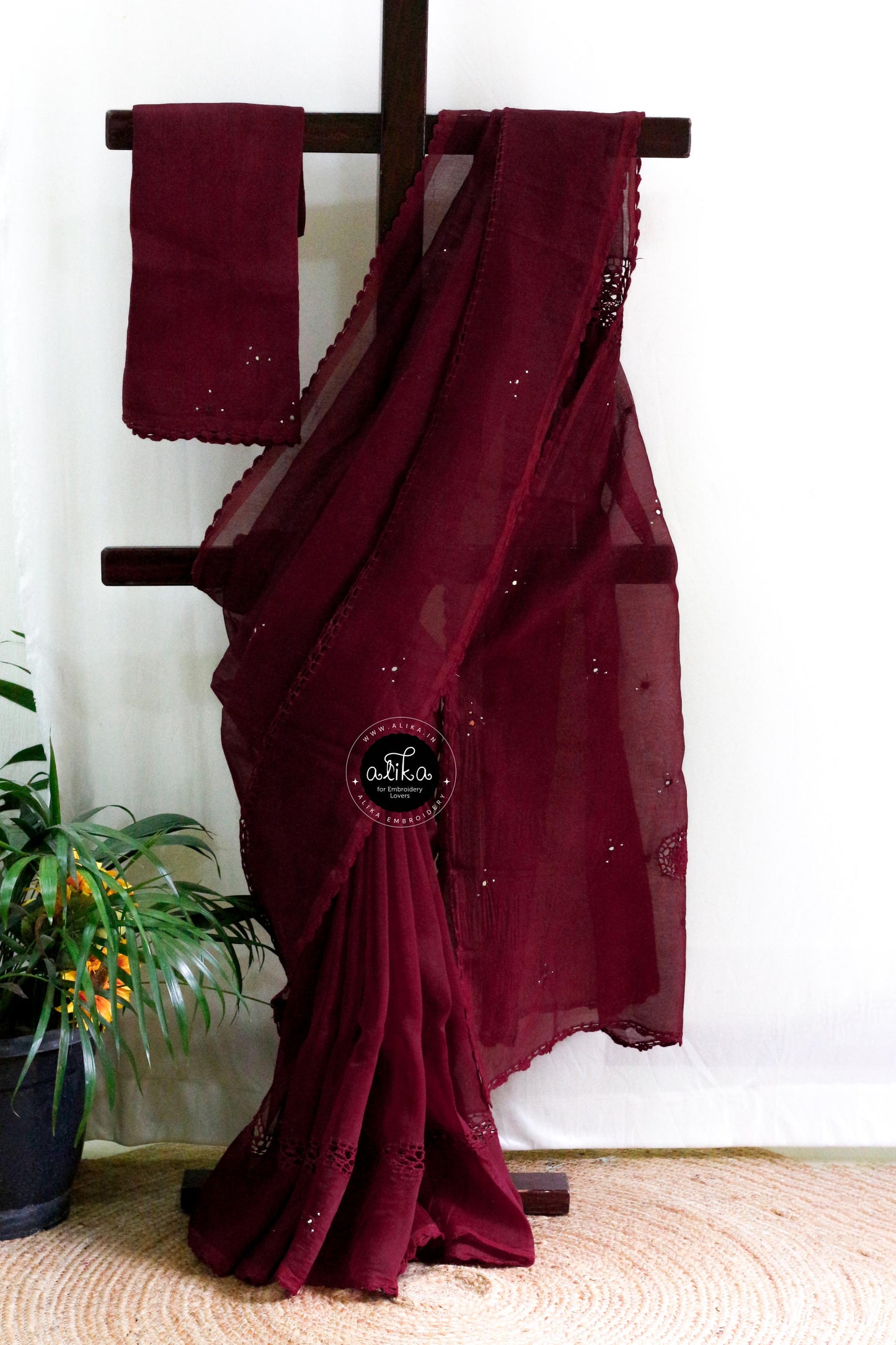 Maroon Kota Doria Saree with Crochet Detailing and Mirror Work