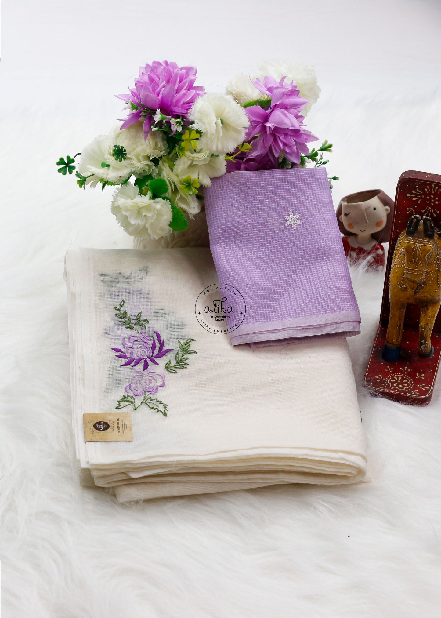 Dreamy Drape: White Kota Doria Saree with Delicate Lavender Machine Embroidery & Contrast Blouse