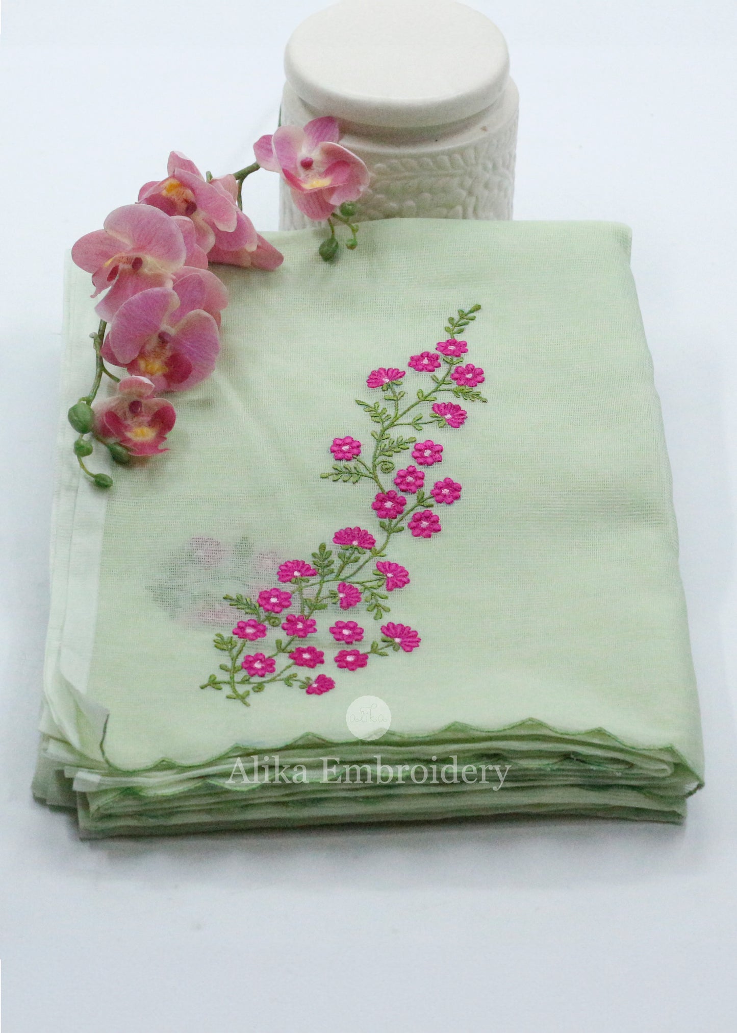 Pistachio Perfection: Silky Kota Saree in Pista Green with Rani Pink Machine Embroidery