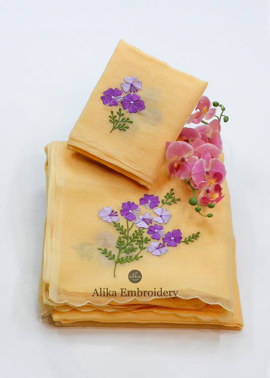 Sunshine Bliss: Yellow Kota Saree with Enchanting Lavender Embroidery.