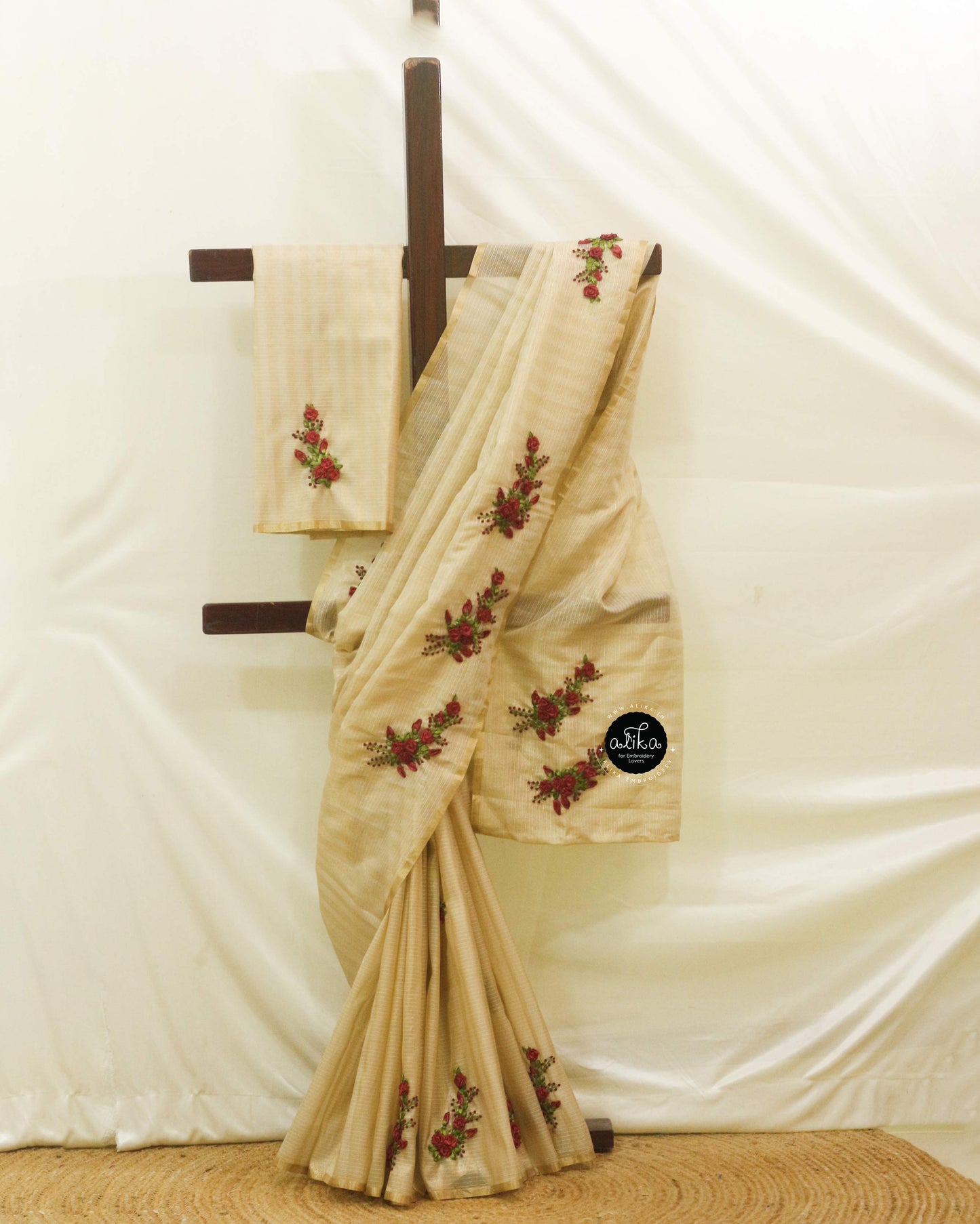 Cream Semi Silk Saree with Golden Stripes and Maroon Ribbon Work – Alika Fashion Store