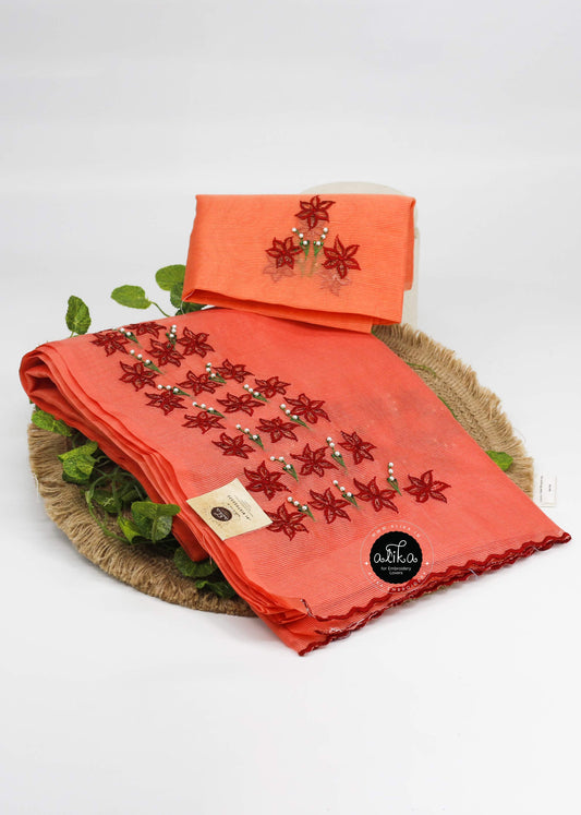 Sunset Orange Kota Saree with Red Floral Cutwork & Pearls – Handcrafted Elegance by Alika Fashion Store