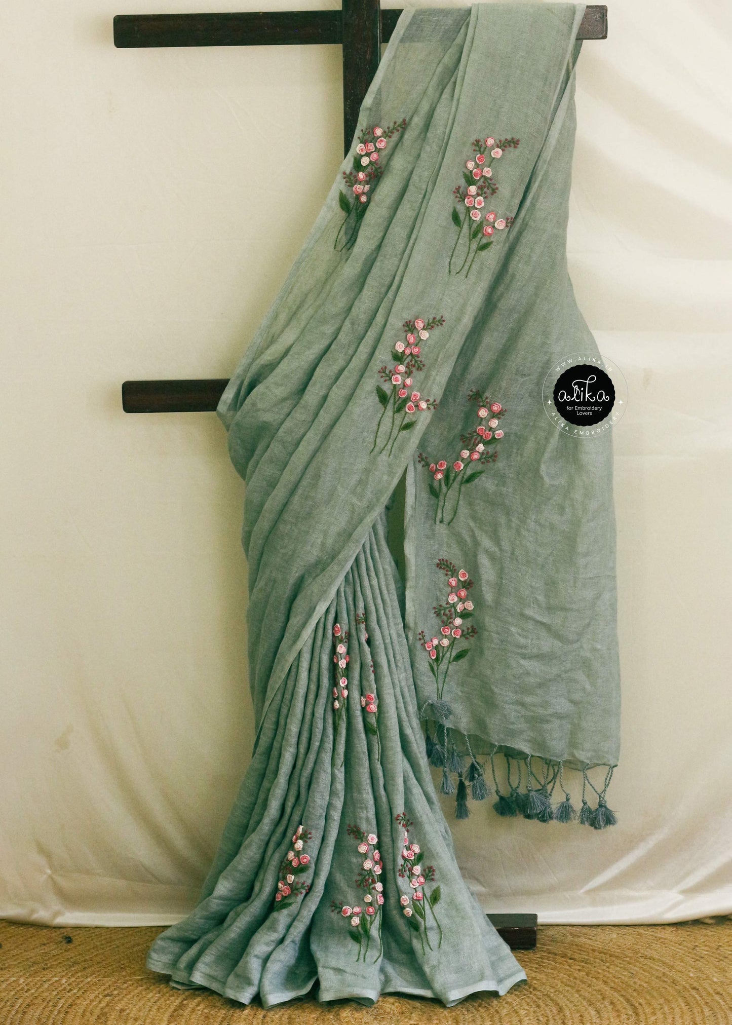 Pistachio Green Pure Linen Saree with Floral Hand Embroidery – Effortless Elegance by Alika Fashion Store