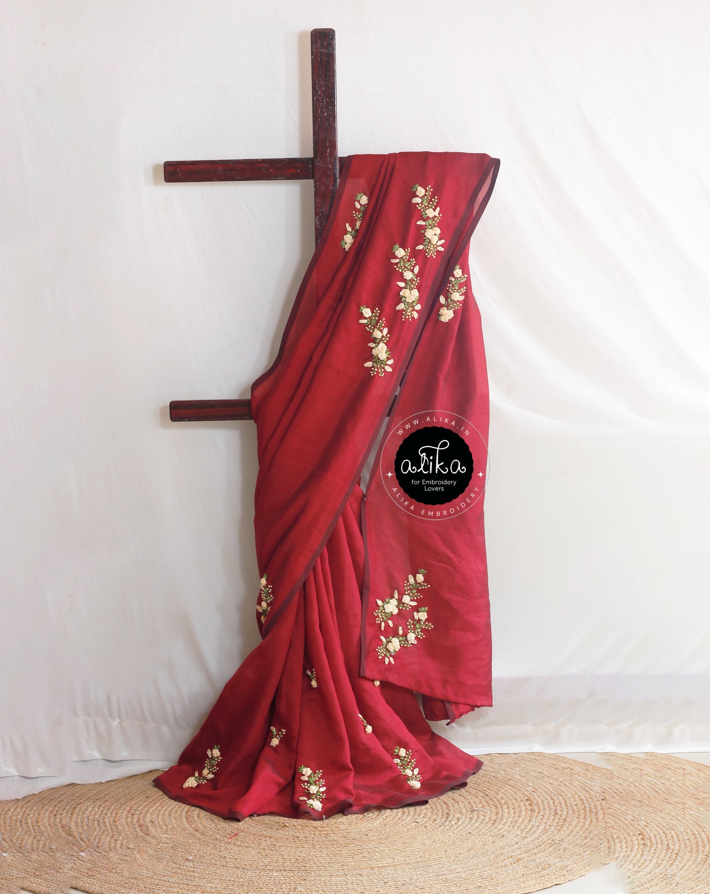 Maroon Soft Silk Saree with Gold Ribbon Embroidery – Elegant Traditional Wear by Alika Fashion Store