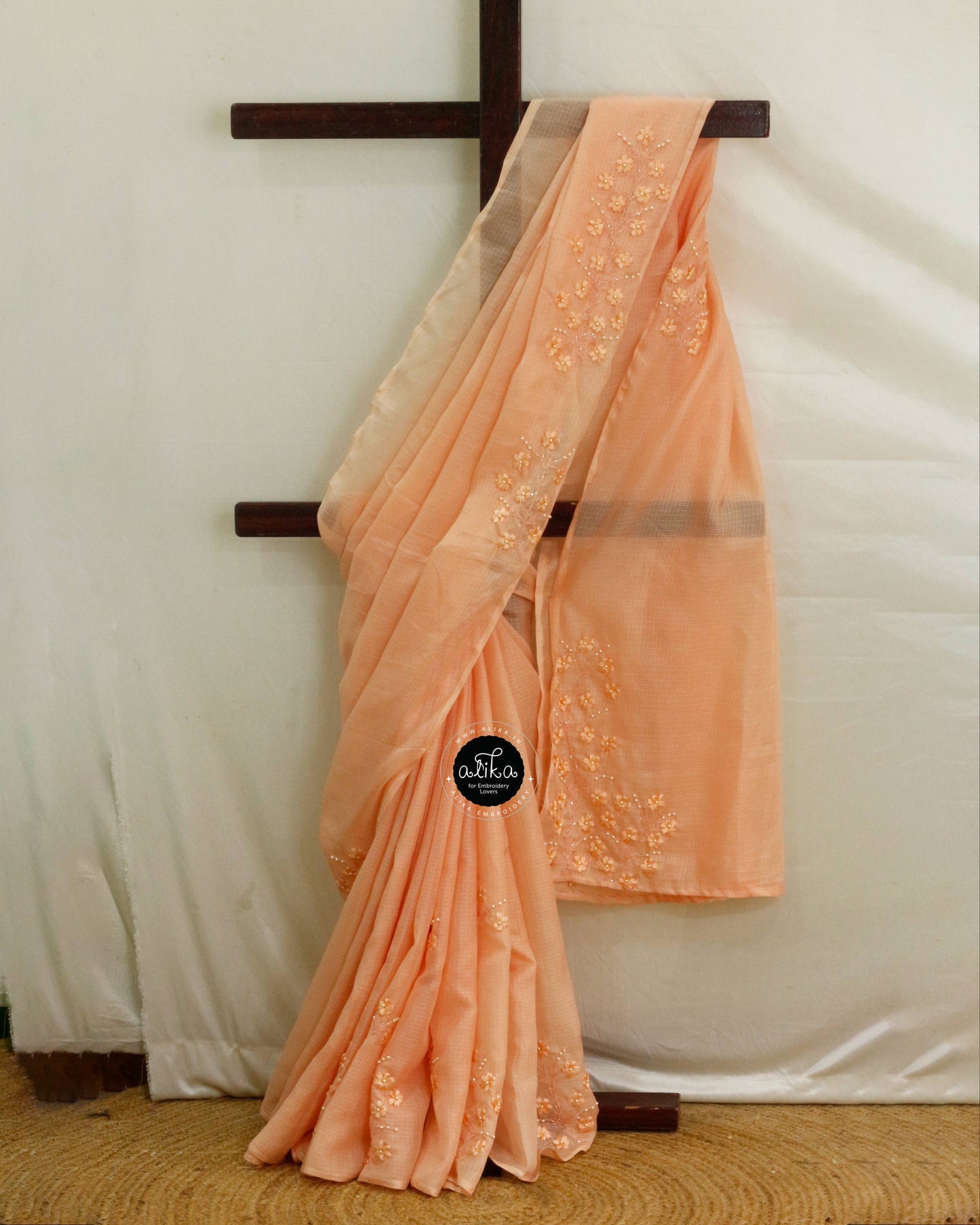 Pinkish Peach Checked Silky Kota Saree with Self-Shaded Ribbon Floral Embroidery | Elegant Ethnic Wear