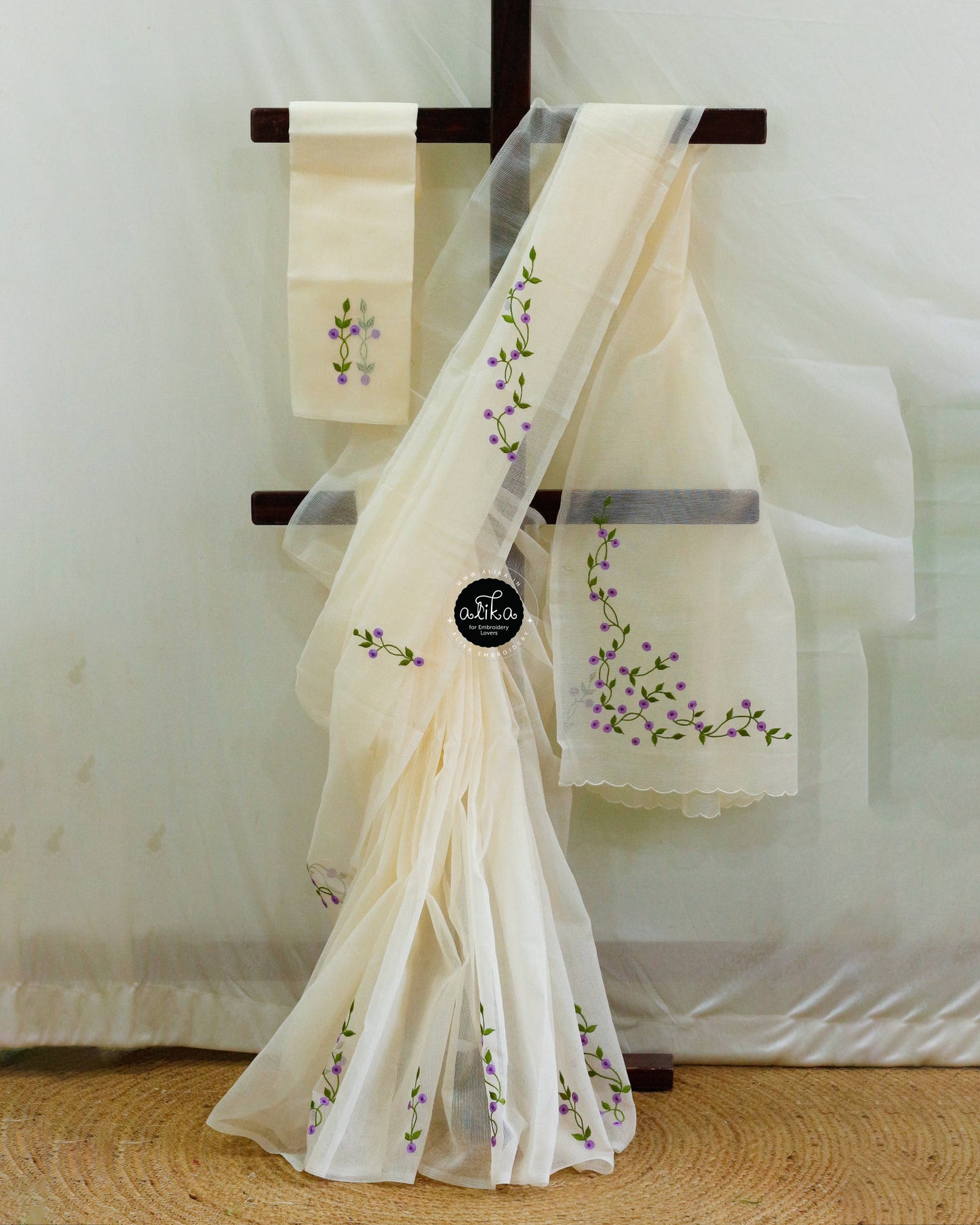 Cream Kota Saree with Intricate Floral Machine Embroidery – Elegant & Timeless