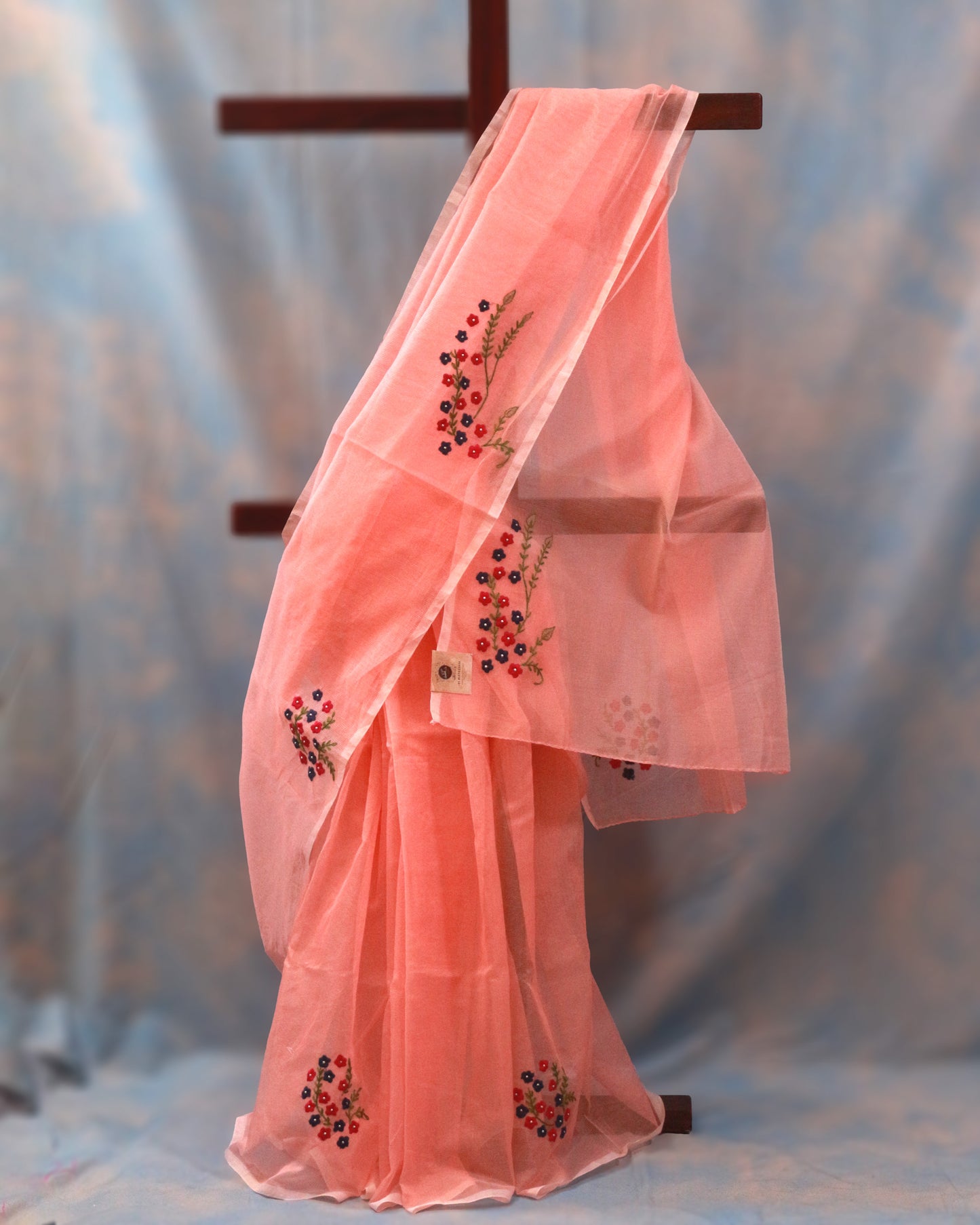 Elegant Peach Kota Saree with Pink and Blue Embroidery | Subtle Charm