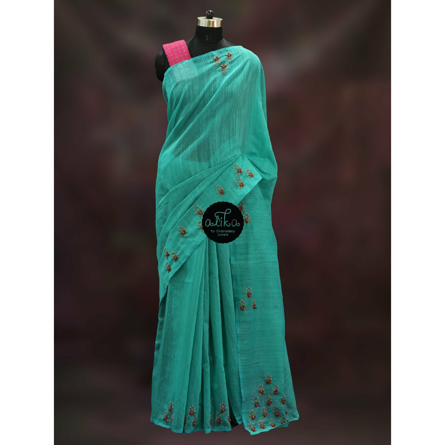 Green jute silk saree with sprig bullion bunch design